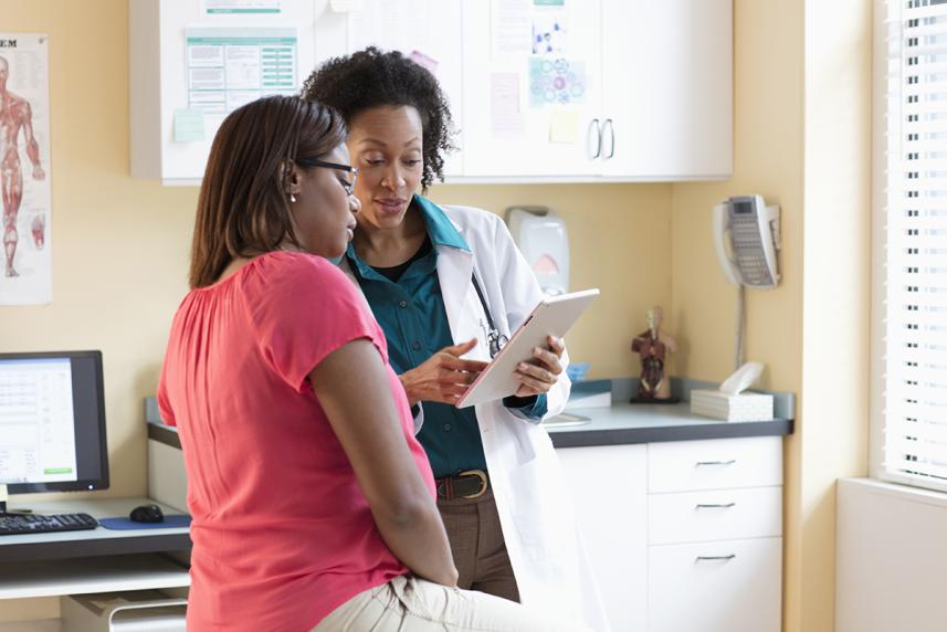 Woman talking with her doctor